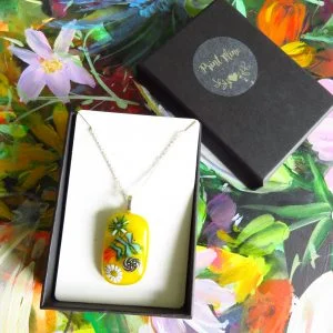Fused glass pendant yellow glass with fish design